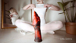 Red Hero Teases Her Tight Ass with a Huge Dildo