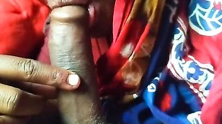 Horny Desi MILF Mom Gives Sloppy Blowjob to Young Boy in Village Bathroom
