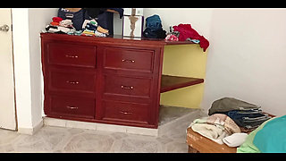 Chubby Girl Tidying the Room and Folding Clothes