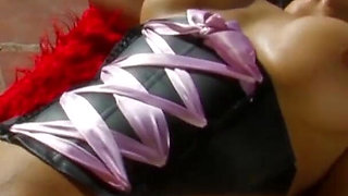 Brunette in corset fucking next to a pool