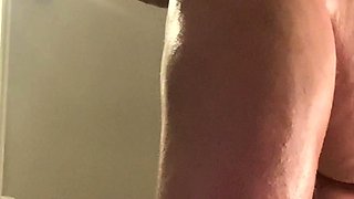 A super sexy brunette massages her big boobs