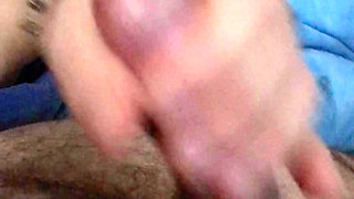 My wife gives me a gorgeous night handjob with a copious cum blast