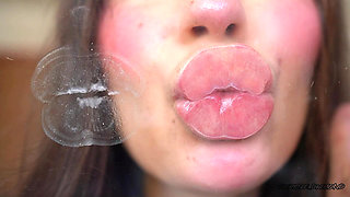 Pillow-soft Glossed Lips in a Melting Sensual Kiss