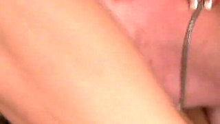 Horny little slut in knee high stockings sucks guy's cock