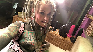 Horny Alternative Tattooed Girl Shows Her Sex Toys With Ass Plug In