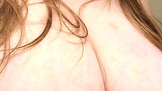 Busty milf showing off her new big boobs on webcam