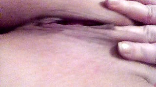 A 50-year-old woman with a beautiful pussy masturbates.