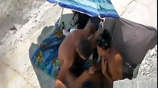 Peeking at stepdaughter and BF on beach