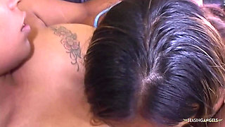 The tattoos on this lesbian bbw shine under the shower before she fucks her girlfriend