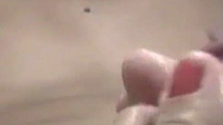 Andrea in Homemade Footjob POV