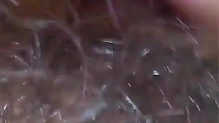 A village girl beautifully pulls her hairy pussy to beautiful music