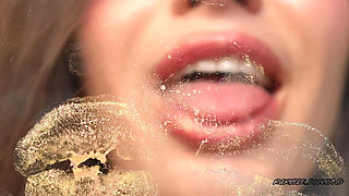 Extremely Shiny Metallic Golden Kiss Close up