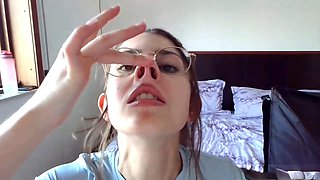 Smiley brunette teen in glasses showing off her petite body solo