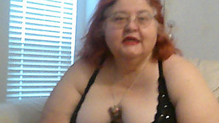 Mature BBW Redhead Nurse Vicki Talks to You as She Makes a Lipstick Applying Video for You!