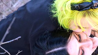 Lesbian teens finger outdoors