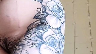 Brunette with big boobs masturbates
