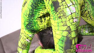 Spineless Lady in Shiny Green Catsuit
