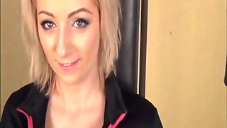 Busty bitch in gym sucking on cock