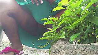 Hot BBW of hairy pussy pissing behind the bush