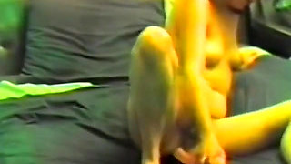 A horny brunette jerking off with two dildos