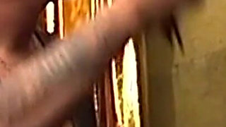 Tattooed Blonde MILF Endures Dungeon Spanking Session