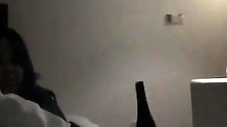 Asian Girl Uses a Bottle to Masturbate