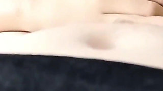 Beautiful Busty Asian Woman in a Romantic Sexual Encounter