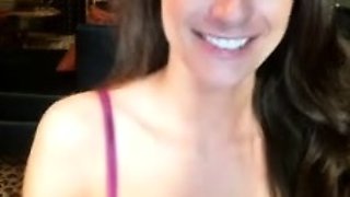 Small titted brunette Sharron with glasses masturbates
