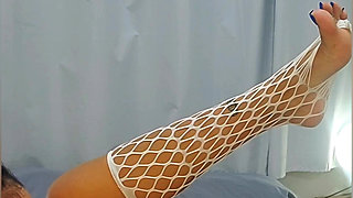 Cute Young Woman in White Lingerie Plays with Her Pussy and Flirts with Her Lovense for the First Time