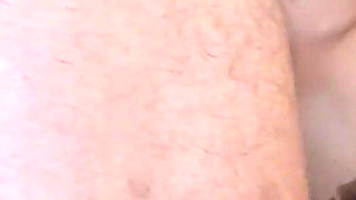 MILF with Sunglasses Gives a Blowjob and Gets a Cumshot in Her Mouth