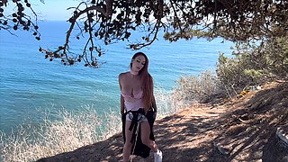 Artemisia Love sexy smoking by the ocean showing her perfect big tits and body for you