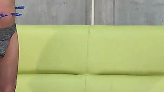 College Girl's Game of Hitting Clothespins with a Whip to Remove Them